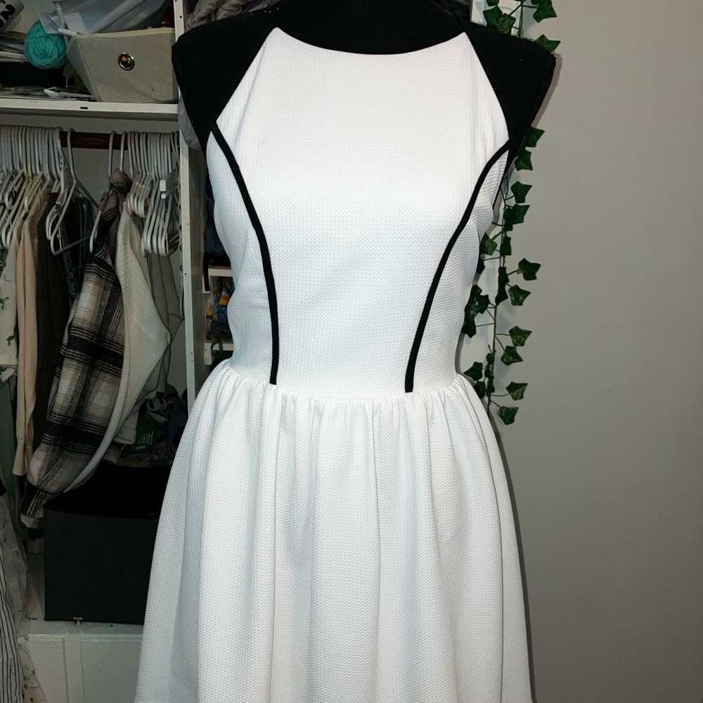 Fit and flare white dress with black detailing
